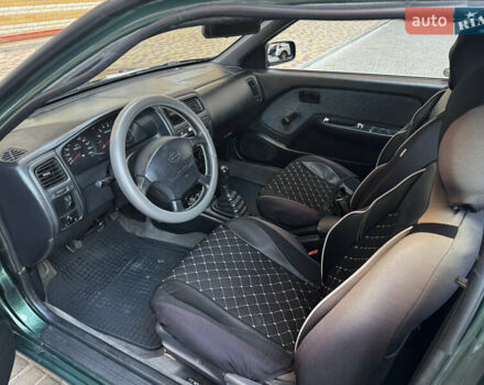 Зеленый Ниссан Альмера, объемом двигателя 1.39 л и пробегом 227 тыс. км за 1900 $, фото 16 на Automoto.ua