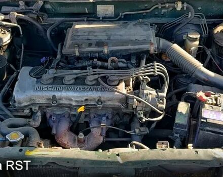 Зелений Ніссан Альмера, об'ємом двигуна 1.4 л та пробігом 450 тис. км за 1200 $, фото 6 на Automoto.ua