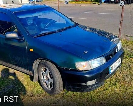 Зелений Ніссан Альмера, об'ємом двигуна 1.4 л та пробігом 450 тис. км за 1200 $, фото 4 на Automoto.ua