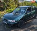 Зеленый Ниссан Альмера, объемом двигателя 1.4 л и пробегом 302 тыс. км за 2300 $, фото 1 на Automoto.ua