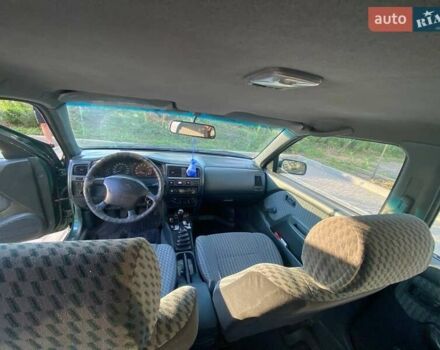 Зелений Ніссан Альмера, об'ємом двигуна 1.4 л та пробігом 275 тис. км за 4000 $, фото 2 на Automoto.ua