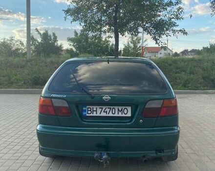 Зелений Ніссан Альмера, об'ємом двигуна 1.4 л та пробігом 275 тис. км за 4000 $, фото 9 на Automoto.ua