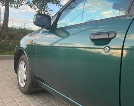 Зелений Ніссан Альмера, об'ємом двигуна 1.4 л та пробігом 275 тис. км за 4000 $, фото 5 на Automoto.ua