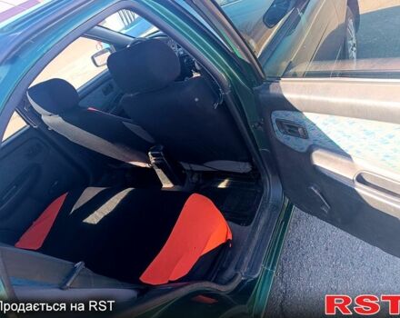 Зелений Ніссан Альмера, об'ємом двигуна 1.4 л та пробігом 400 тис. км за 2200 $, фото 4 на Automoto.ua