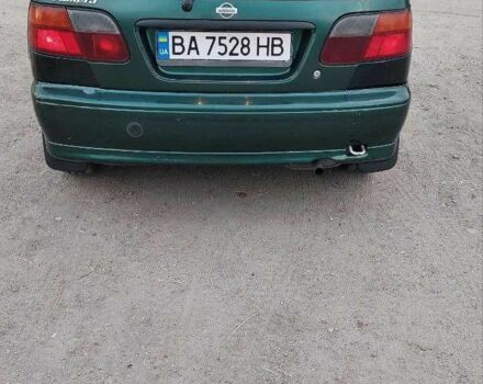 Зеленый Ниссан Альмера, объемом двигателя 1.4 л и пробегом 262 тыс. км за 1999 $, фото 1 на Automoto.ua