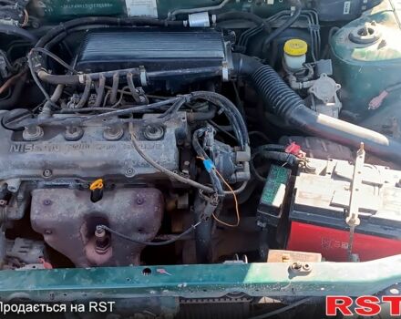 Зелений Ніссан Альмера, об'ємом двигуна 1.4 л та пробігом 400 тис. км за 2200 $, фото 9 на Automoto.ua