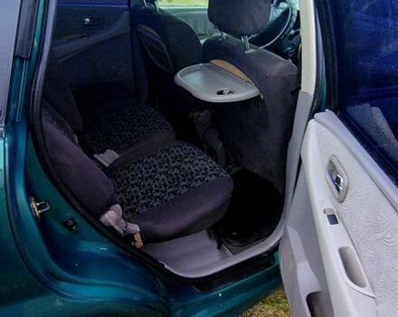 Зелений Ніссан Альмера, об'ємом двигуна 2.2 л та пробігом 350 тис. км за 2100 $, фото 11 на Automoto.ua