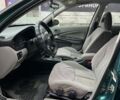 Зеленый Ниссан Альмера, объемом двигателя 1.8 л и пробегом 245 тыс. км за 3999 $, фото 12 на Automoto.ua