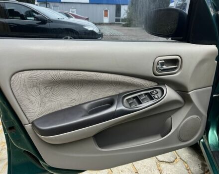 Зеленый Ниссан Альмера, объемом двигателя 1.8 л и пробегом 245 тыс. км за 3999 $, фото 10 на Automoto.ua