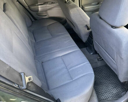 Зеленый Ниссан Альмера, объемом двигателя 1.46 л и пробегом 369 тыс. км за 3000 $, фото 6 на Automoto.ua