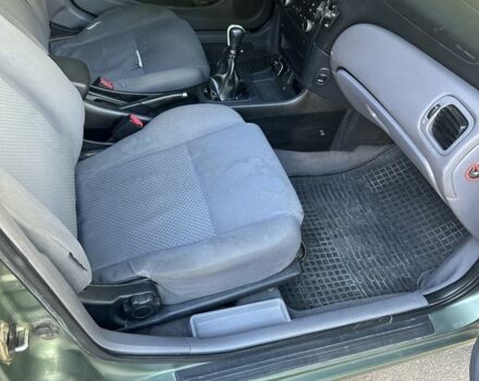 Зеленый Ниссан Альмера, объемом двигателя 1.5 л и пробегом 369 тыс. км за 3500 $, фото 7 на Automoto.ua