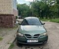 Зеленый Ниссан Альмера, объемом двигателя 1.46 л и пробегом 377 тыс. км за 2000 $, фото 1 на Automoto.ua