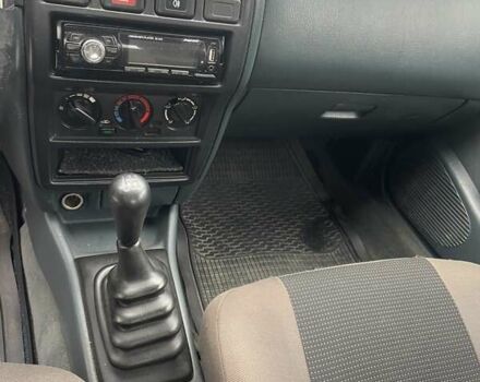 Зеленый Ниссан Альмера, объемом двигателя 1.39 л и пробегом 234 тыс. км за 1900 $, фото 11 на Automoto.ua