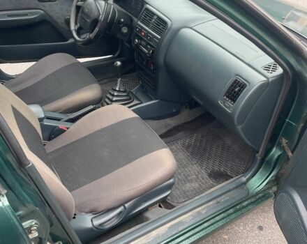 Зеленый Ниссан Альмера, объемом двигателя 1.4 л и пробегом 234 тыс. км за 1900 $, фото 15 на Automoto.ua