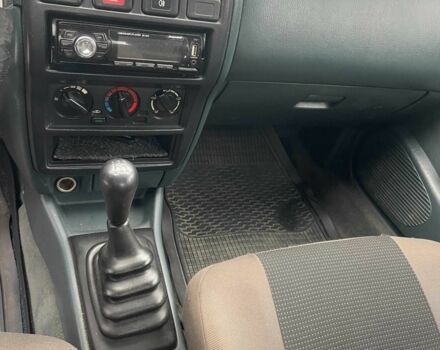 Зеленый Ниссан Альмера, объемом двигателя 1.4 л и пробегом 234 тыс. км за 1900 $, фото 11 на Automoto.ua