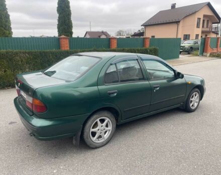 Зеленый Ниссан Альмера, объемом двигателя 1.4 л и пробегом 234 тыс. км за 1900 $, фото 5 на Automoto.ua