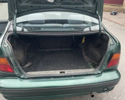 Зеленый Ниссан Альмера, объемом двигателя 1.39 л и пробегом 234 тыс. км за 1900 $, фото 14 на Automoto.ua