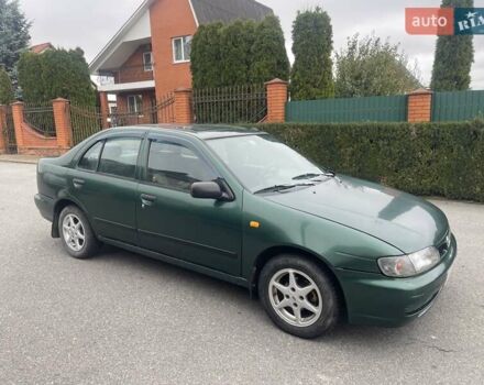 Зеленый Ниссан Альмера, объемом двигателя 1.39 л и пробегом 234 тыс. км за 1900 $, фото 6 на Automoto.ua