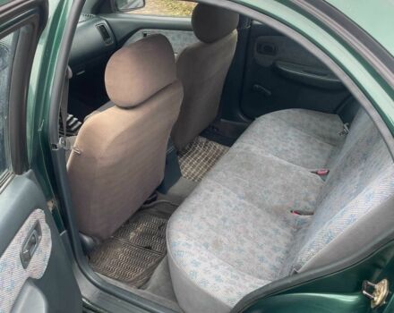 Зеленый Ниссан Альмера, объемом двигателя 1.4 л и пробегом 234 тыс. км за 1900 $, фото 13 на Automoto.ua