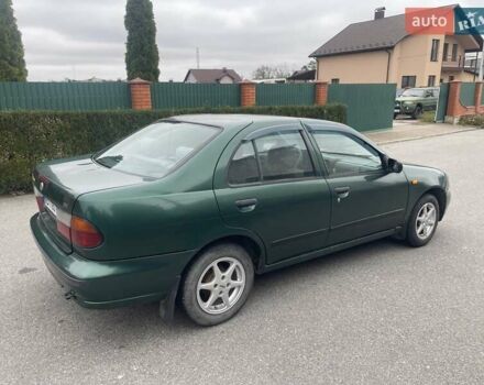 Зеленый Ниссан Альмера, объемом двигателя 1.39 л и пробегом 234 тыс. км за 1900 $, фото 5 на Automoto.ua