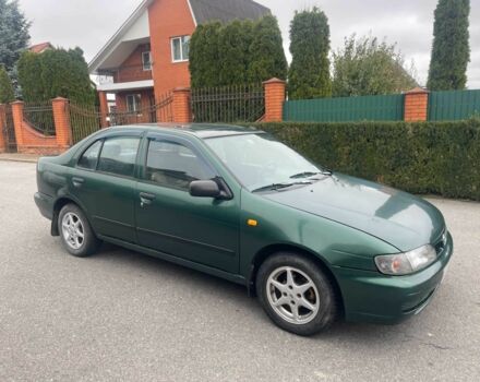 Зеленый Ниссан Альмера, объемом двигателя 1.4 л и пробегом 234 тыс. км за 1900 $, фото 6 на Automoto.ua