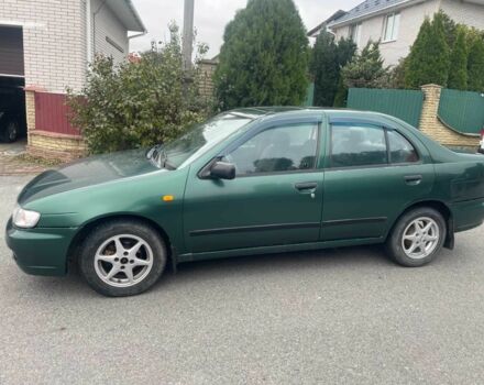 Зеленый Ниссан Альмера, объемом двигателя 1.4 л и пробегом 234 тыс. км за 1900 $, фото 1 на Automoto.ua