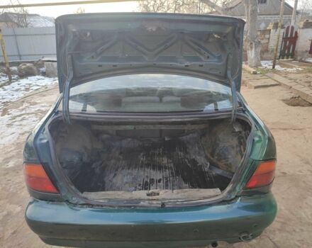 Зелений Ніссан Альмера, об'ємом двигуна 1.4 л та пробігом 100 тис. км за 1000 $, фото 6 на Automoto.ua