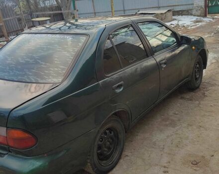 Зелений Ніссан Альмера, об'ємом двигуна 1.4 л та пробігом 100 тис. км за 1000 $, фото 1 на Automoto.ua