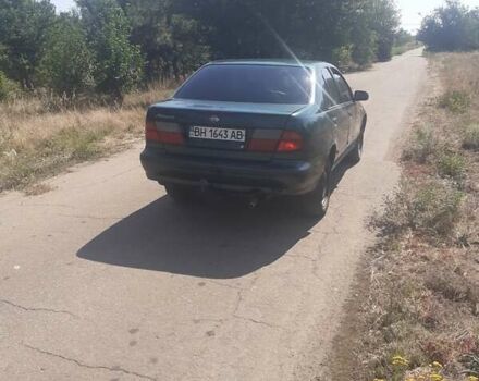 Зеленый Ниссан Альмера, объемом двигателя 1.4 л и пробегом 130 тыс. км за 1500 $, фото 3 на Automoto.ua