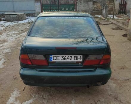 Зелений Ніссан Альмера, об'ємом двигуна 1.4 л та пробігом 100 тис. км за 1000 $, фото 2 на Automoto.ua