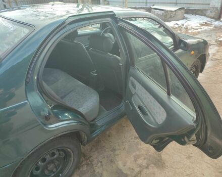 Зелений Ніссан Альмера, об'ємом двигуна 1.4 л та пробігом 100 тис. км за 1000 $, фото 5 на Automoto.ua