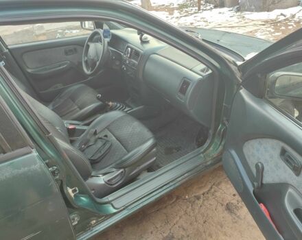 Зелений Ніссан Альмера, об'ємом двигуна 1.4 л та пробігом 100 тис. км за 1000 $, фото 4 на Automoto.ua