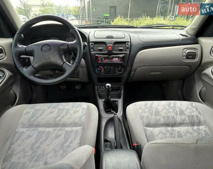 Зелений Ніссан Альмера, об'ємом двигуна 1.5 л та пробігом 276 тис. км за 3700 $, фото 6 на Automoto.ua