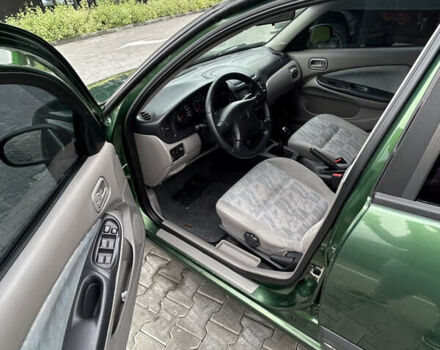 Зелений Ніссан Альмера, об'ємом двигуна 1.5 л та пробігом 276 тис. км за 3700 $, фото 7 на Automoto.ua