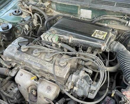 Зелений Ніссан Альмера, об'ємом двигуна 1.6 л та пробігом 200 тис. км за 1750 $, фото 13 на Automoto.ua
