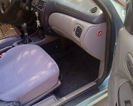 Зелений Ніссан Альмера, об'ємом двигуна 1 л та пробігом 250 тис. км за 3000 $, фото 5 на Automoto.ua