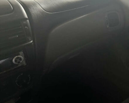 Зелений Ніссан Альмера, об'ємом двигуна 1.8 л та пробігом 340 тис. км за 3100 $, фото 5 на Automoto.ua