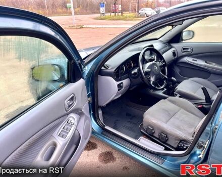 Зелений Ніссан Альмера, об'ємом двигуна 1.8 л та пробігом 217 тис. км за 2800 $, фото 10 на Automoto.ua