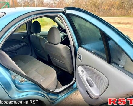 Зелений Ніссан Альмера, об'ємом двигуна 1.8 л та пробігом 217 тис. км за 2800 $, фото 12 на Automoto.ua