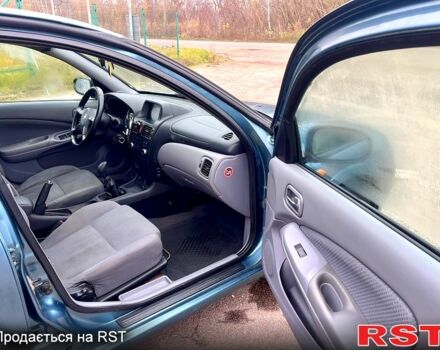 Зелений Ніссан Альмера, об'ємом двигуна 1.8 л та пробігом 217 тис. км за 2800 $, фото 11 на Automoto.ua