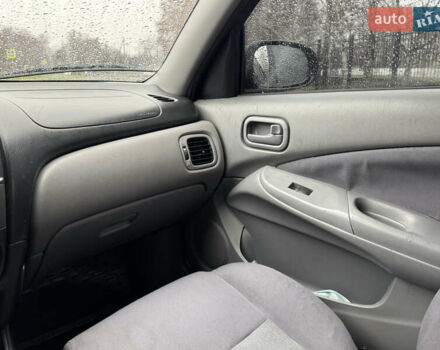 Зеленый Ниссан Альмера, объемом двигателя 1.5 л и пробегом 270 тыс. км за 3700 $, фото 24 на Automoto.ua