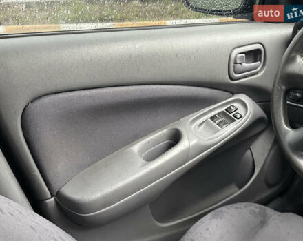 Зеленый Ниссан Альмера, объемом двигателя 1.5 л и пробегом 270 тыс. км за 3700 $, фото 22 на Automoto.ua