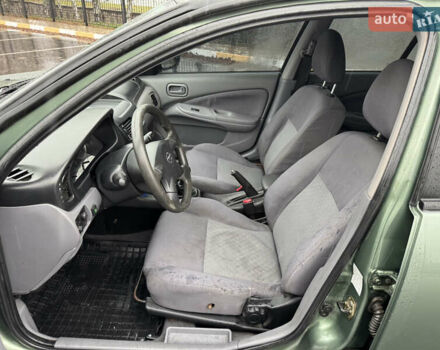 Зеленый Ниссан Альмера, объемом двигателя 1.5 л и пробегом 270 тыс. км за 3700 $, фото 15 на Automoto.ua