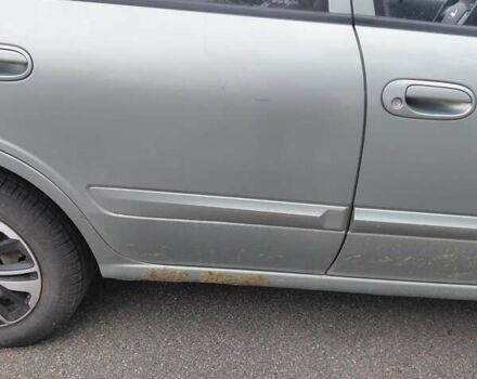 Зеленый Ниссан Альмера, объемом двигателя 1.6 л и пробегом 233 тыс. км за 3700 $, фото 3 на Automoto.ua