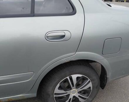 Зеленый Ниссан Альмера, объемом двигателя 1.6 л и пробегом 233 тыс. км за 3700 $, фото 7 на Automoto.ua