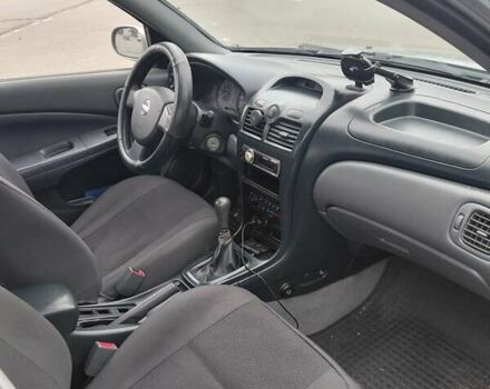 Зеленый Ниссан Альмера, объемом двигателя 1.6 л и пробегом 233 тыс. км за 3700 $, фото 5 на Automoto.ua