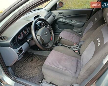 Зеленый Ниссан Альмера, объемом двигателя 1.6 л и пробегом 191 тыс. км за 5700 $, фото 14 на Automoto.ua