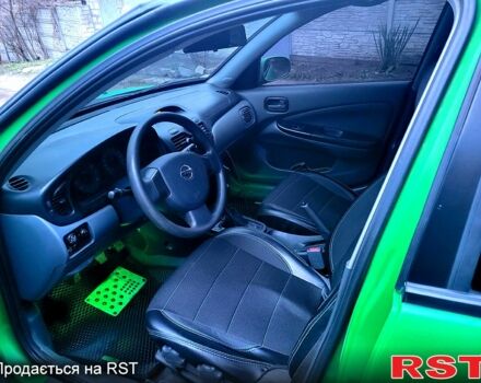 Зеленый Ниссан Альмера, объемом двигателя 16 л и пробегом 280 тыс. км за 5000 $, фото 8 на Automoto.ua
