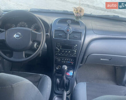 Зеленый Ниссан Альмера, объемом двигателя 1.6 л и пробегом 233 тыс. км за 3450 $, фото 4 на Automoto.ua