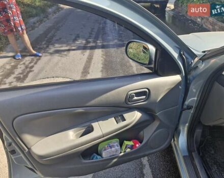 Зелений Ніссан Альмера, об'ємом двигуна 1.6 л та пробігом 133 тис. км за 6100 $, фото 6 на Automoto.ua